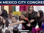 Shocking scenes erupted inside Mexico’s legislative chamber as lawmakers shoved, yelled, and pulled each other’s hair Shocking scenes erupted inside Mexico’s legislative chamber as lawmakers shoved, yelled, and pulled each other’s hair