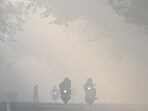 A layer of fog, combined with pollution, seen during a cold morning at Mandi House on Tuesday. (Sanchit Khanna/HT Photo)