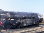 Restoration work is underway as several buses and cars catch fire following a collision on the Delhi-Agra Expressway, in Mathura on Tuesday.