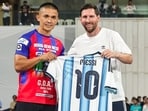 Argentine footballer Lionel Messi with Indian footballer Sunil Chhetri during the 'GOAT India Tour 2025', at Wankhede Stadium, in Mumbai.