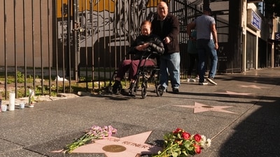 Flowers cover the Walk of Fame star for Rob Reiner Monday, Dec. 15, 2025, in the Hollywood section of Los Angeles. (AP Photo/Damian Dovarganes) (AP) Flowers cover the Walk of Fame star for Rob Reiner Monday, Dec. 15, 2025, in the Hollywood section of Los Angeles. (AP Photo/Damian Dovarganes) (AP)