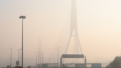 A layer of smog seen engulfed during a cold morning at Wazirabad in New Delhi, India, on Tuesday, December 16, 2025. (Sanchit Khanna/HT Photo) A layer of smog seen engulfed during a cold morning at Wazirabad in New Delhi, India, on Tuesday, December 16, 2025. (Sanchit Khanna/HT Photo)