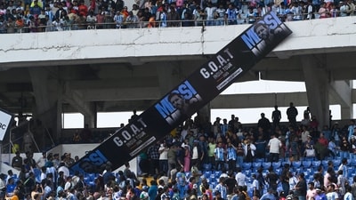 Angry fans vandalise banners, throw bottles, ripped up seats and threw them on the pitch after Argentina football star Lionel Messi's early departure from the Salt Lake Stadium during his India Tour in Kolkata. (Samir Jana/Hindustan Times) Angry fans vandalise banners, throw bottles, ripped up seats and threw them on the pitch after Argentina football star Lionel Messi's early departure from the Salt Lake Stadium during his India Tour in Kolkata. (Samir Jana/Hindustan Times)