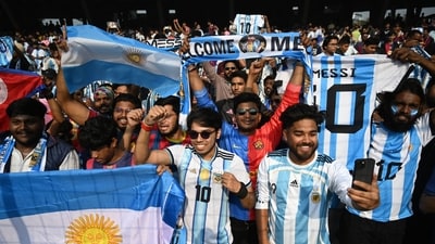 Argentina football star Lionel Messi's fans are seen with posters at the Salt Lake Stadium in Kolkata. (Samir Jana/ Hindustan Times) Argentina football star Lionel Messi's fans are seen with posters at the Salt Lake Stadium in Kolkata. (Samir Jana/ Hindustan Times)