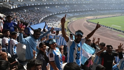 Argentine football star Lionel Messi's fans with posters waiting for his arrival at the Salt Lake Stadium in Kolkata on Saturday, December 13, 2025. (Samir Jana/ Hindustan Times) Argentine football star Lionel Messi's fans with posters waiting for his arrival at the Salt Lake Stadium in Kolkata on Saturday, December 13, 2025. (Samir Jana/ Hindustan Times)