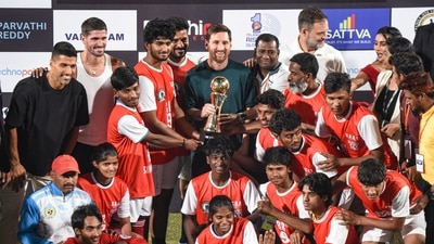 Argentine footballer Lionel Messi and Telangana chief minister Revanth Reddy present a trophy to a football team during an event as part of the second leg of 'GOAT India Tour 2025', in Hyderabad. (PTI) Argentine footballer Lionel Messi and Telangana chief minister Revanth Reddy present a trophy to a football team during an event as part of the second leg of 'GOAT India Tour 2025', in Hyderabad. (PTI)