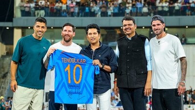 Argentine football star Lionel Messi, Uruguayan footballer Luis Suarez, cricket legend Sachin Tendulkar, Maharashtra chief minister Devendra Fadnavis and Argentine footballer Rodrigo De Paul during an event as part of the 'GOAT India Tour 2025', at the Wankhede Stadium, in Mumbai. (PTI) Argentine football star Lionel Messi, Uruguayan footballer Luis Suarez, cricket legend Sachin Tendulkar, Maharashtra chief minister Devendra Fadnavis and Argentine footballer Rodrigo De Paul during an event as part of the 'GOAT India Tour 2025', at the Wankhede Stadium, in Mumbai. (PTI)