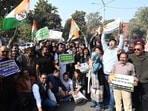Congress party workers protesting against the BJP at Sector 35 in Chandigarh. (Keshav Singh/HT) Congress party workers protesting against the BJP at Sector 35 in Chandigarh. (Keshav Singh/HT)