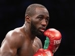 Terence "Bud" Crawford, left, fights David Avanesyan during a WBO welterweight title boxing bout in 2022. Terence "Bud" Crawford, left, fights David Avanesyan during a WBO welterweight title boxing bout in 2022.