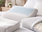 Memory foam pillows help align the spine and neck better and provide more comfortable sleep.(AI generated)