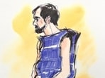 Nick Reiner, wearing a blue protective vest, makes his first court appearance on murder charges for the killing of his parents Rob and Michele Weiner.