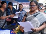Bengal SIR draft rolls: People enrol at a Special Intensive Revision (SIR) of electoral rolls camp at the Sonagachi area, in Kolkata.