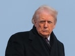 President Donald Trump boards Air Force One en route to Delaware on December 17, in Joint Base Andrews, Maryland. 
