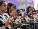 Visitors try out miniature models of wista field camera during the 30th International Film Festival of Kerala (IFFK) at Tagore Theatre, in Thiruvananthapuram. (PTI) Visitors try out miniature models of wista field camera during the 30th International Film Festival of Kerala (IFFK) at Tagore Theatre, in Thiruvananthapuram. (PTI)