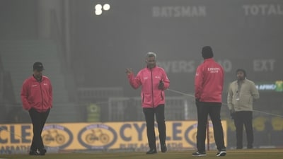 The umpires inspecting the playing condition due to low visibility as India vs South Africa T20 cricket match is delayed due to foggy weather. (HT)