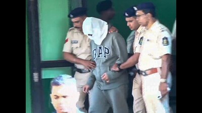 One of the Luthra brothers, co-owners of the Birch by Romeo Lane nightclub, being taken by police personnel to a court in connection with the December 6 fire incident that killed 25 persons, at Anjuna police station, in North Goa district on Wednesday. (PTI) One of the Luthra brothers, co-owners of the Birch by Romeo Lane nightclub, being taken by police personnel to a court in connection with the December 6 fire incident that killed 25 persons, at Anjuna police station, in North Goa district on Wednesday. (PTI)