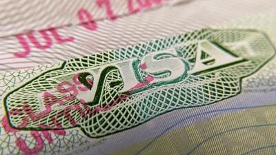 This photo illustration shows a visa stamp on a foreign passport in Los Angeles on June 6, 2020. - The United States said June 6 it would not allow foreign students to remain in the country if all of their classes are moved online in the fall over the coronavirus crisis. (Photo by Chris DELMAS / AFP) (AFP) This photo illustration shows a visa stamp on a foreign passport in Los Angeles on June 6, 2020. - The United States said June 6 it would not allow foreign students to remain in the country if all of their classes are moved online in the fall over the coronavirus crisis. (Photo by Chris DELMAS / AFP) (AFP)