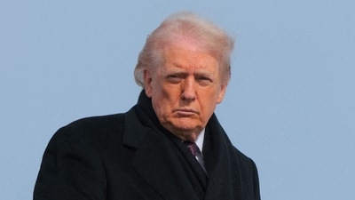 President Donald Trump boards Air Force One en route to Delaware on December 17, in Joint Base Andrews, Maryland. (Getty Images via AFP) President Donald Trump boards Air Force One en route to Delaware on December 17, in Joint Base Andrews, Maryland. (Getty Images via AFP)