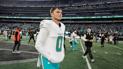 Miami Dolphins quarterback Zach Wilson walks off the field after playing against the New York Jets (AP) Miami Dolphins quarterback Zach Wilson walks off the field after playing against the New York Jets (AP)