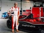 Ajith Kumar with the Formula E car made by Mahindra in Spain. Ajith Kumar with the Formula E car made by Mahindra in Spain.