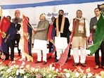 Bihar CM Nitish Kumar along with Dy CMs Samrat Choudhary and Vijay Sinha flag off 34 mobile forensic vehicles in Patna, Thursday (SANTOSH KUMAR/HT)