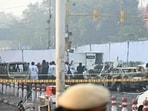 Forensic experts investigate at the blast site following an explosion near the Red Fort in the old quarters of Delhi. (AFP FILE)