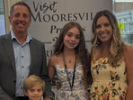 Greg Biffle, with his wife, Cristina Grossu and their children. Greg Biffle, with his wife, Cristina Grossu and their children.