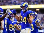 Colby Parkinson #84 of the Los Angeles Rams celebrates with teammates after scoring a touchdown against the Detroit Lions