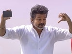 Vijay shows crowd at Erode public rally the video he shot on his phone before posting it on social media. (@TVKVijayHQ-Offl Y/T)