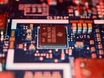 Semiconductor chips are seen on a circuit board of a computer in this representational image. RRP Semiconductor has rejected rumours about its supposed links to cricketer Sachin Tendulkar and to state-allotted land for chipmaking.