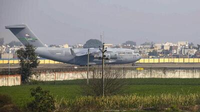 A US military aircraft carrying illegal Indian immigrants at the Shri Guru Ramdas Ji International Airport in Amritsar on February 5. As many as 330 youngsters from Punjab and Haryana were deported on board US military planes in February. (File photo) A US military aircraft carrying illegal Indian immigrants at the Shri Guru Ramdas Ji International Airport in Amritsar on February 5. As many as 330 youngsters from Punjab and Haryana were deported on board US military planes in February. (File photo)