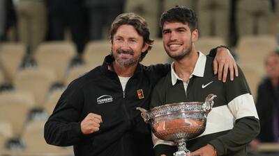 Carlos Alcaraz, right, poses with Juan Carlos Ferrero after winning the French Open in June 2025. (AP) Carlos Alcaraz, right, poses with Juan Carlos Ferrero after winning the French Open in June 2025. (AP)
