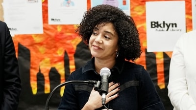 Catherine Almonte Da Costa speaks during a press conference in New York City (REUTERS)