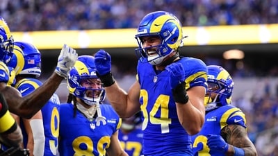 Colby Parkinson #84 of the Los Angeles Rams celebrates with teammates after scoring a touchdown against the Detroit Lions (Getty Images via AFP)