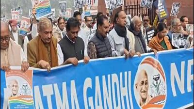 The MPs conducted a march holding posters bearing the slogan “Will not tolerate the disrespect of Mahatma Gandhi” (Mahatma Gandhi ka apman nahi sahenge nahi sahenge) (ANI) The MPs conducted a march holding posters bearing the slogan “Will not tolerate the disrespect of Mahatma Gandhi” (Mahatma Gandhi ka apman nahi sahenge nahi sahenge) (ANI)