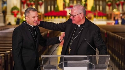 New York Archbishop, Timothy Dolan, right, greets Bishop Ronald Hicks during a news conference, Thursday, Dec.18, 2025 in New York. (AP) New York Archbishop, Timothy Dolan, right, greets Bishop Ronald Hicks during a news conference, Thursday, Dec.18, 2025 in New York. (AP)