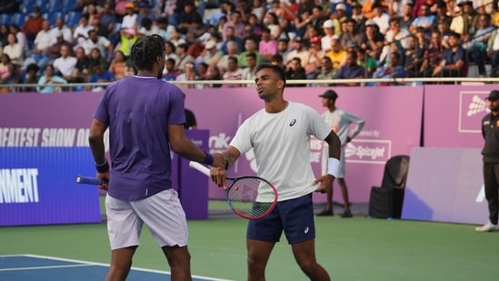 Sumit Nagal with Gael Monfils during their match.