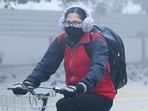 A morning commuter wears a mask during commute. (Vipin Kumar/HT Photo)