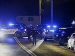 Law enforcement officers seen in the area where the Brown University shooting suspect was reportedly spotted in Salem, N.H. Law enforcement officers seen in the area where the Brown University shooting suspect was reportedly spotted in Salem, N.H.