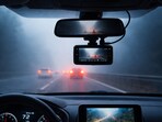 Dash cams designed to handle fog, low light, and sudden visibility changes, helping drivers stay protected on risky, mist-heavy roads.(AI generated)