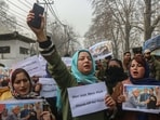PDP supporters hold placards during a protest against Bihar CM Nitish Kumar over hijab row, in Srinagar on Friday. (Waseem Andrabi /HT)