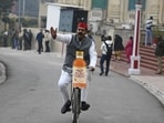 Samajwadi Party MLC Ashutosh Sinha holds a protest on the cough syrup issue at the Uttar Pradesh legislature complex in Lucknow on Friday. (Deepak Gupta/HT) Samajwadi Party MLC Ashutosh Sinha holds a protest on the cough syrup issue at the Uttar Pradesh legislature complex in Lucknow on Friday. (Deepak Gupta/HT)