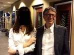 Bill Gates appears with a woman, who's identity has been obscured, in this image from the Epstein estate released by House Oversight Committee Democrats in Washington, D.C., U.S., on December 18, 2025. 