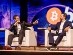 Eric Trump and Donald Trump Jr., executive vice presidents for the Trump Organization, at a bitcoin event this year.