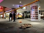 A piece of cloth lies outside Eslite Spectrum Nanxi store near Zhongshan station as the entrance of the building is cordoned off with yellow crime scene tape, following an incident in which several were injured after a person released smoke bombs and attacked bystanders, according to the government and local media, in Taipei, Taiwan, on December 19, 2025.