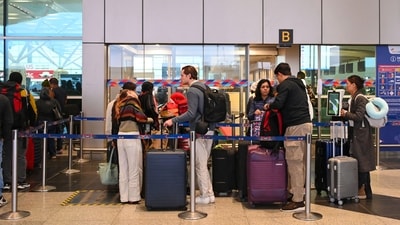 Passengers standing in a queue outside the Delhi airport. (HT Photo) Passengers standing in a queue outside the Delhi airport. (HT Photo)