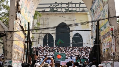Members of multiple organisations, including Khelafat Majlis, join a protest rally at the Baitul Mukarram National Mosque after Friday prayer, demanding justice for the death of Sharif Osman Hadi. (REUTERS)