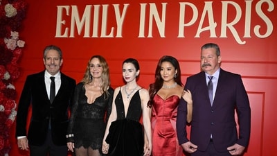 Darren Star, Philippine Leroy-Beaulieu, Lily Collins, Ashley Park during the premiere of Netflix TV series "Emily in Paris" season 5 in Paris. (AFP) Darren Star, Philippine Leroy-Beaulieu, Lily Collins, Ashley Park during the premiere of Netflix TV series "Emily in Paris" season 5 in Paris. (AFP)