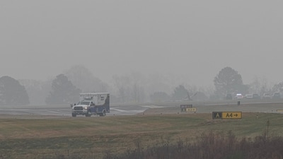 First responders tend to the scene of the plane crash on which Greg Biffle and his family were traveling. (AP) First responders tend to the scene of the plane crash on which Greg Biffle and his family were traveling. (AP)