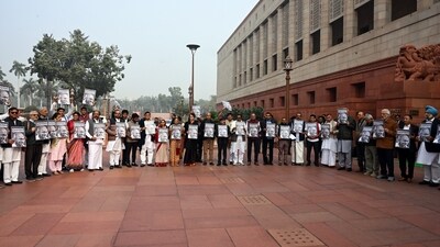 Opposition parties led by Congress stand together to protest against MNREGA name change in front of the parliament building on the last day of the winter session today. (Jitender Gupta/ANI)
